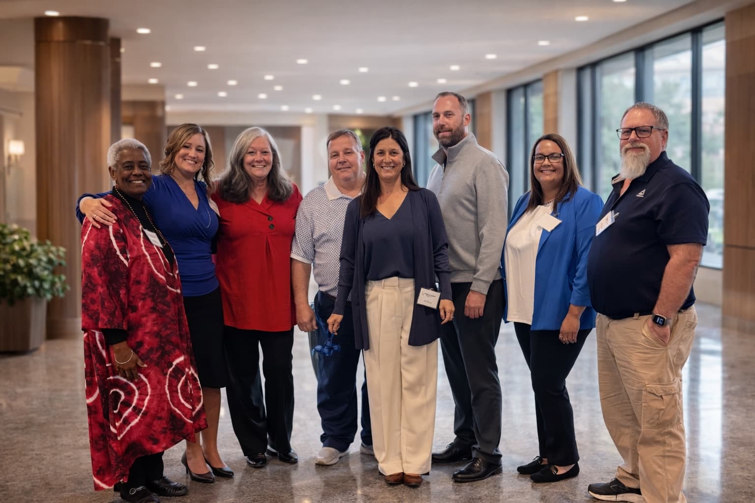The East Texas Benefits team standing together outside the Gilmer office